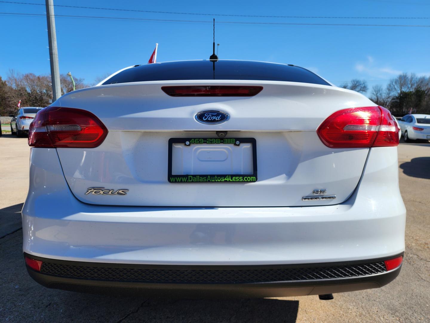 2016 WHITE Ford Focus SE (1FADP3F24GL) with an 2.0L L4 DOHC 16V engine, AUTO transmission, located at 2660 S.Garland Avenue, Garland, TX, 75041, (469) 298-3118, 32.885551, -96.655602 - Welcome to DallasAutos4Less, one of the Premier BUY HERE PAY HERE Dealers in the North Dallas Area. We specialize in financing to people with NO CREDIT or BAD CREDIT. We need proof of income, proof of residence, and a ID. Come buy your new car from us today!! This is a Super Clean 2016 FORD FOCUS - Photo#4